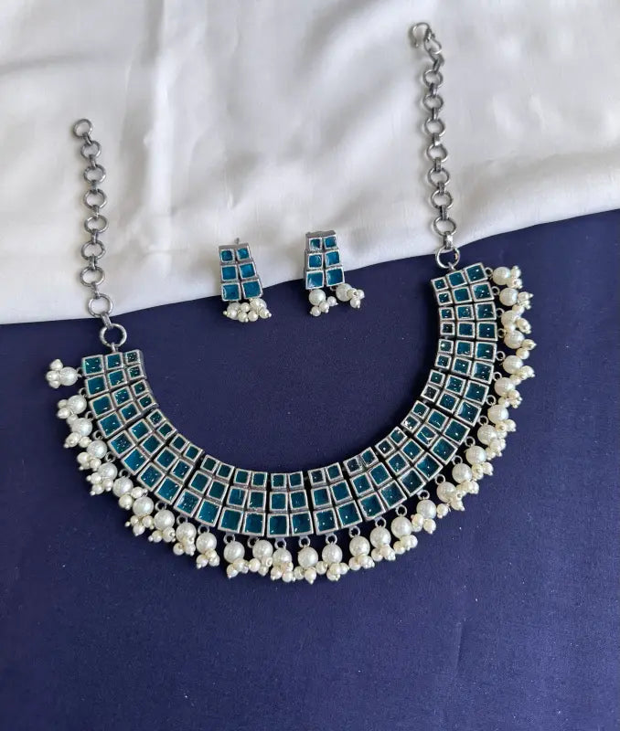 Handcrafted Meenakari Necklace with Cultured Pearls and Brass Accents
-Short Necklace Sets