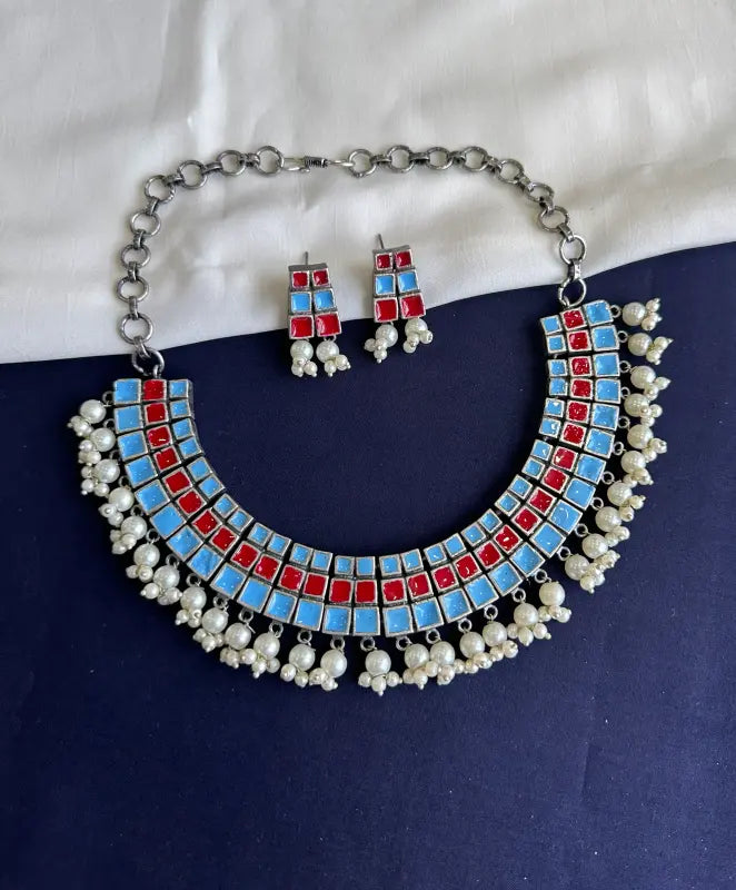 Handcrafted Meenakari Necklace with Cultured Pearls and Brass Accents
-Short Necklace Sets