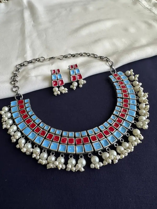Handcrafted Meenakari Necklace with Cultured Pearls and Brass Accents
-Short Necklace Sets