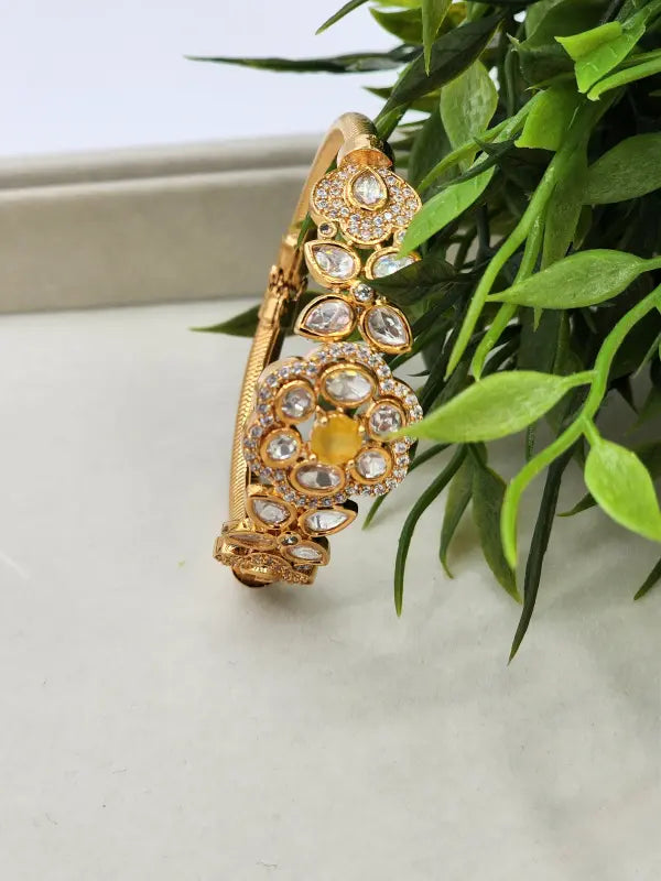 Handcrafted Kundan Jewelry with White Glass Stone and Golden Tone - Bracelet