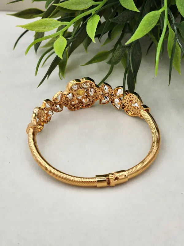 Handcrafted Kundan Jewelry with White Glass Stone and Golden Tone - Bracelet