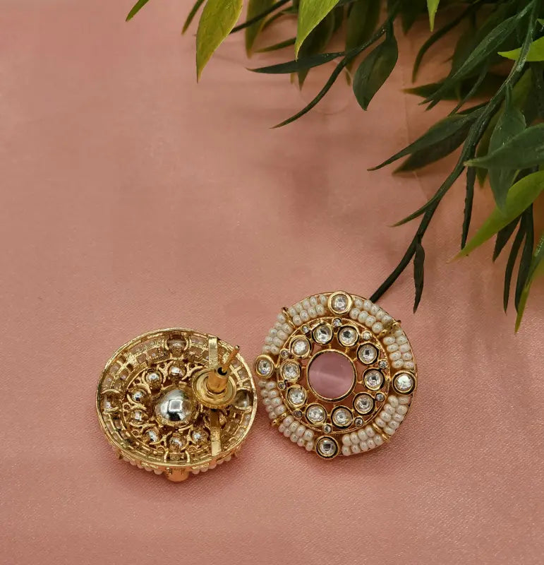Handcrafted Kundan Jewelry with Pink Beadwork in Golden Tone
- Earrings